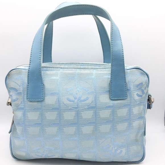 CHANEL Handbags - CHANEL rare baby blue travel line handbag
